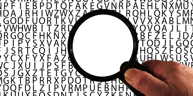 Text with magnifying glass